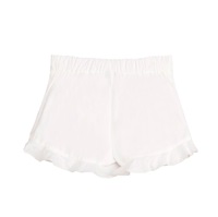 Imagen de Falda pantalón de niña en blanco con volante