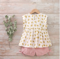 Imagen de Conjunto niña blusa estampados limones y short de rosa bambula