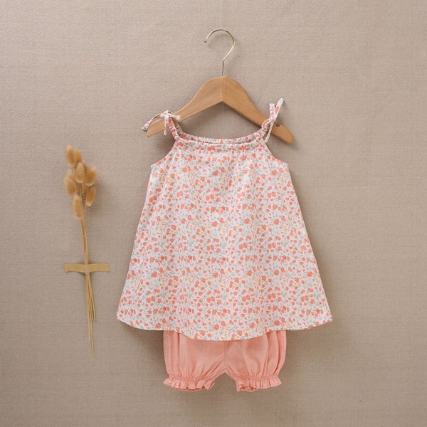 Imagen de Vestido con cubrepañal de bebé niña estampado de flores en tonos rosas