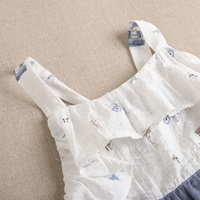 Imagen de Vestido de niña en azul denim combinado con estampado