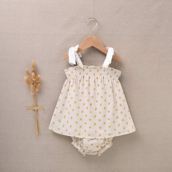 Imagen de Vestido con cubrepañal de bebé niña con estampado de lunares en tonos amarillos