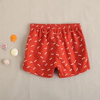 Imagen de Bañador de niño en color rojo estampado de cintura elástica y cordón de color blanco 