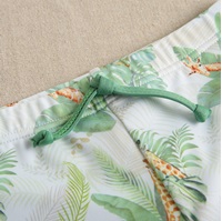 Imagen de Bañador bóxer de bebé niño en color verde con estampado y cordón elástico de color verde 