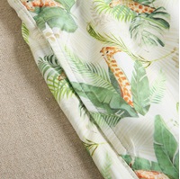 Imagen de Bañador de niño en color verde con estampado de cintura elástica y cordón de color verde 