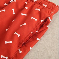 Imagen de Bañador de niño en color rojo estampado de cintura elástica y cordón de color blanco 