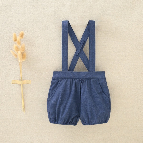 Imagen de Peto de bebé niño azul marino con tirantes de espalda cruzada