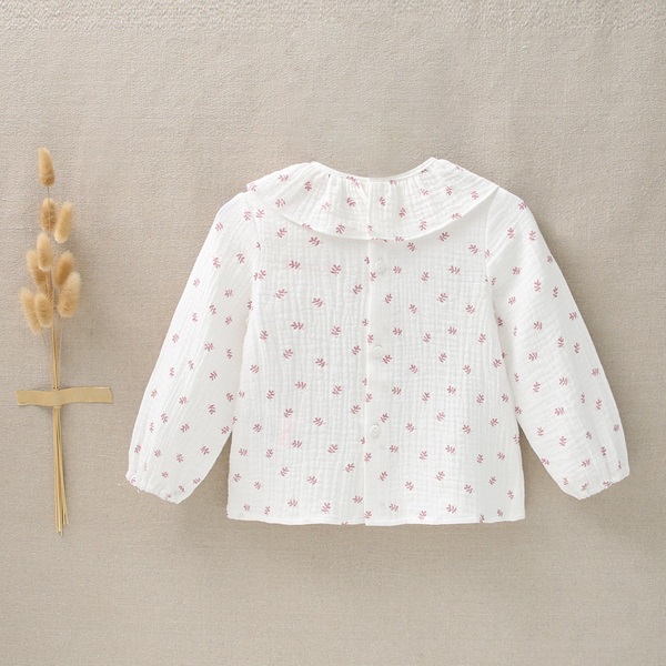 Imagen de Camisa de bebé niña con cuello de volante en estampado de ramitas rosas