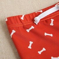 Imagen de Bañador bóxer de bebé niño en color rojo estampado y cordón elástico de color blanco