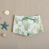 Imagen de Bañador bóxer de bebé niño en color verde con estampado y cordón elástico de color verde 