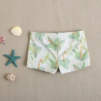 Imagen de Bañador bóxer de bebé niño en color verde con estampado y cordón elástico de color verde 