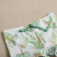 Imagen de Bañador bóxer de bebé niño en color verde con estampado y cordón elástico de color verde 