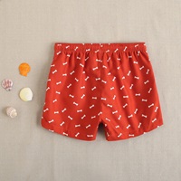 Imagen de Bañador de niño en color rojo estampado de cintura elástica y cordón de color blanco 