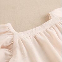 Imagen de Vestido de niña en gasa en color beige