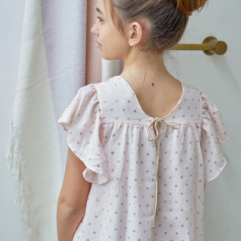 Imagen de Vestido de niña rosa con lunares dorados