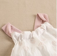 Imagen de Vestido de niña blanco con globos y detalles en rosa.