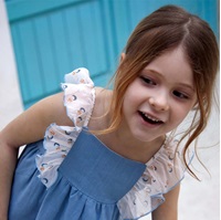 Imagen de Vestido de bebé niña en lino azul combinado con gasa estampada