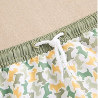 Imagen de Bañador bermuda para niño con estampado de camuflaje en mostaza y verdes