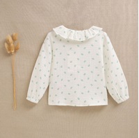 Imagen de Blusa bebé niña blanca con estampado  de flores verdes