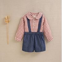 Imagen de Conjunto de bebé niño con camisa de cuadros de vichy caldera y blanco y short liso vaquero con tirantes