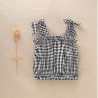 Imagen de Blusa de tirantes para niña en cuadros vichy negros y blancos