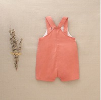 Imagen de Peto de bebé niño corto en color coral