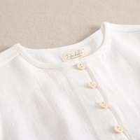 Imagen de Camisa de niño blanca bolsillo canguro