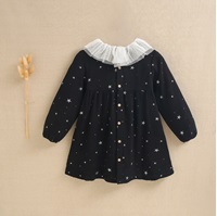 Imagen de Vestido de niña negro con estrellas en purpurina plata y cuello volante