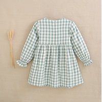 Imagen de Vestido de franela para niña en cuadros vichy verde agua y blanco con lazo