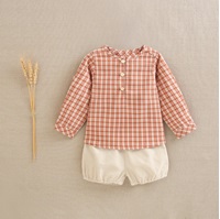 Imagen de Conjunto de bebé niño de camisa en cuadros bicolor caldera y blanco y pololo de micropana beige liso