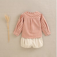 Imagen de Conjunto de bebé niño de camisa en cuadros bicolor caldera y blanco y pololo de micropana beige liso