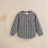 Imagen de Camisa de niño de cuadros bicolor beige tostado y negro con cuello mao