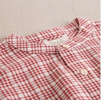 Imagen de Camisa de niño de cuadros bicolor rojo y blanco con bolsillo delantero