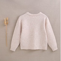 Imagen de Chaqueta de punto para niña en color beige con botones de madera