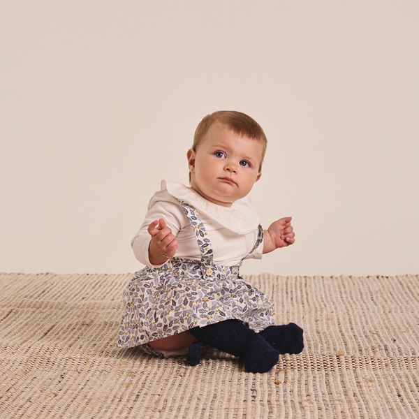 Imagen de Ranita de bebé niña con estampado de hojas azul y mostaza