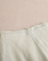 Imagen de Pantalón de niña verde pastel fluido con textura