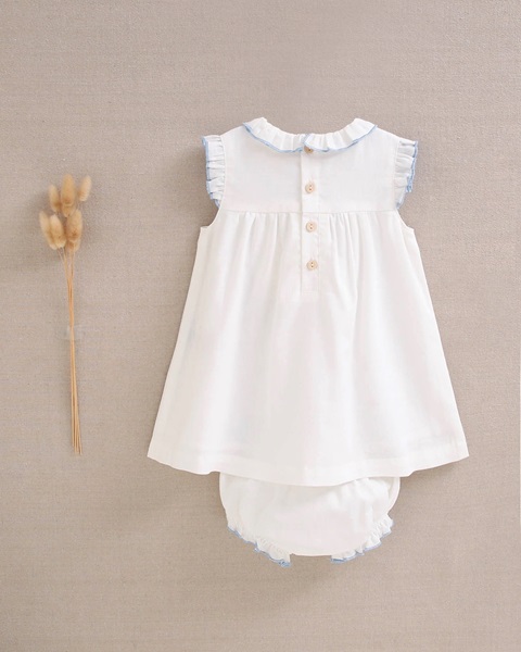 Imagen de Vestido de bebé blanco con bordes azules y braguita a juego