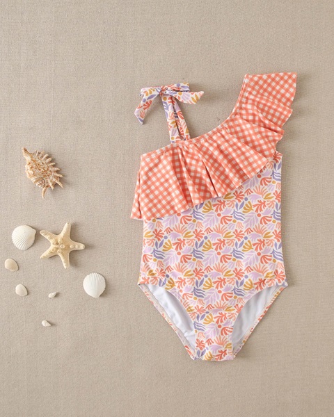 Imagen de Bañador de niña con estampado floral y volante vichy naranja