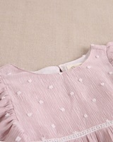 Imagen de Vestido de niña de plumeti rosa con topitos blancos