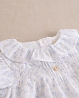 Imagen de Vestido de bebé niña blanco con estampado y braguita a juego