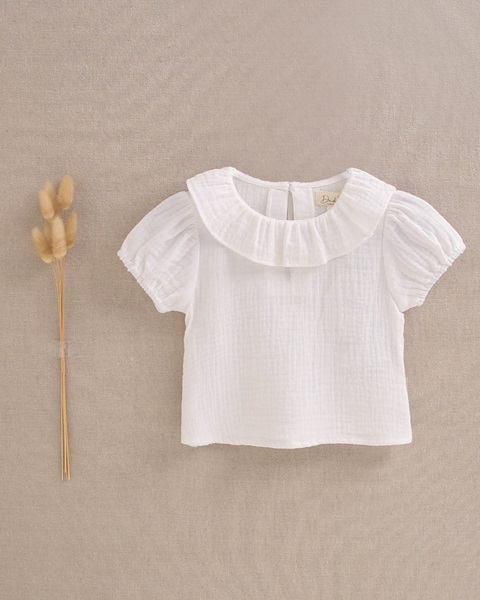 Imagen de Blusa de bebé niña de muselina blanca con manga abullonada