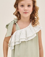 Imagen de Vestido de niña verde pastel con volante asimétrico y lazo