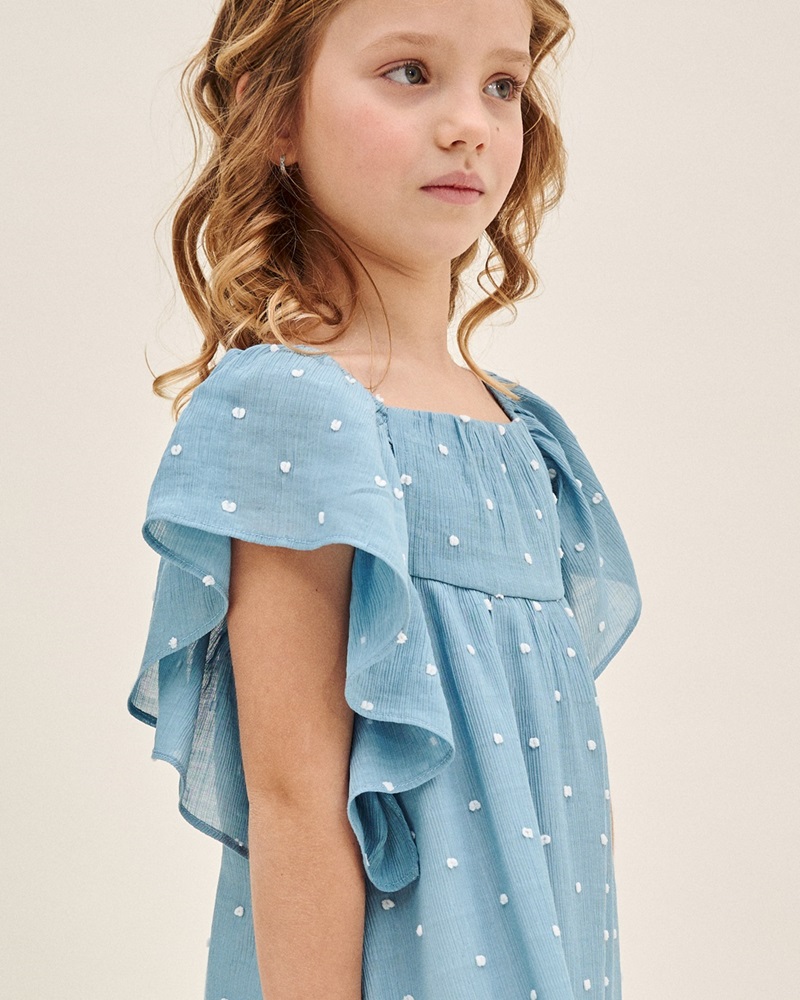 Imagen de Vestido de niña plumeti azul con topos blancos