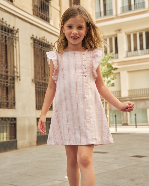 Imagen de Vestido de niña naranja de rayas con volantes y lazo